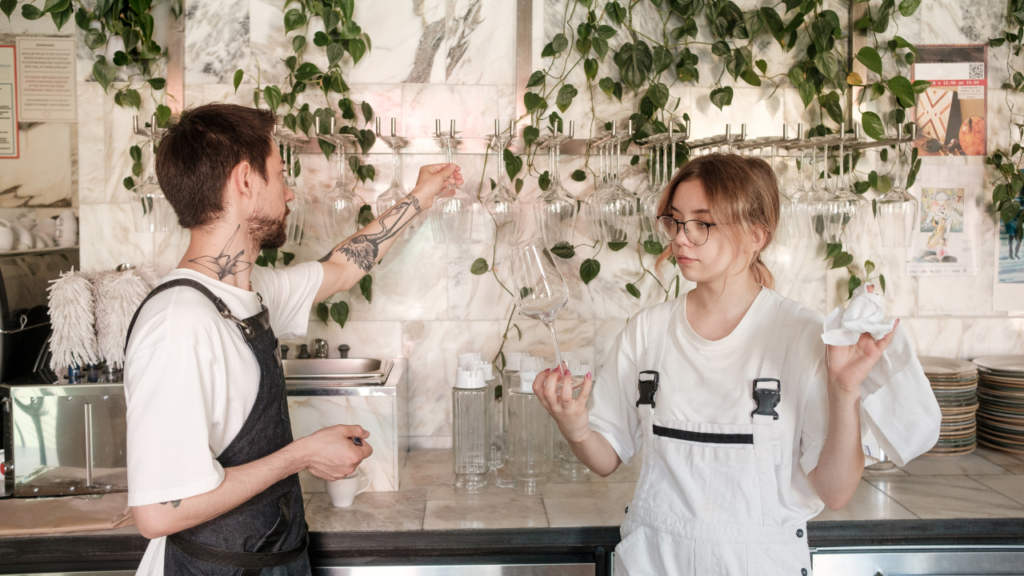 waitress polishing glasses